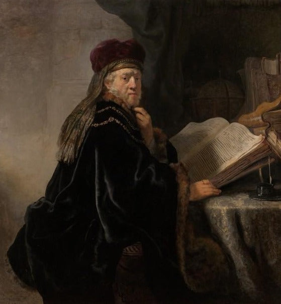 Un erudito sentado en un escritorio – Rembrandt van Rijn Rembrandt van Rijn mx.artemisreproduction.com